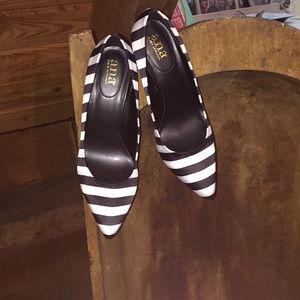 Black and white stripe pumps